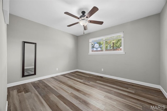 4035 Mary Ridge Ln, Saint Charles, MO 63304 - spare room featuring a ceiling fan and wood finished floors