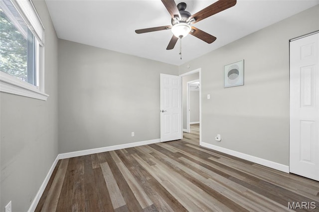 4035 Mary Ridge Ln, Saint Charles, MO 63304 - unfurnished bedroom featuring wood finished floors and a ceiling fan