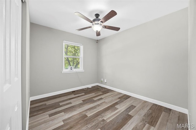 4035 Mary Ridge Ln, Saint Charles, MO 63304 - empty room with a ceiling fan and wood finished floors