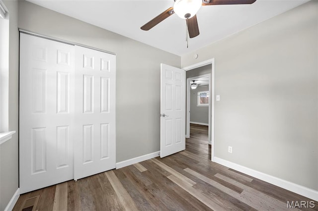 4035 Mary Ridge Ln, Saint Charles, MO 63304 - unfurnished bedroom with wood finished floors, a closet, and ceiling fan