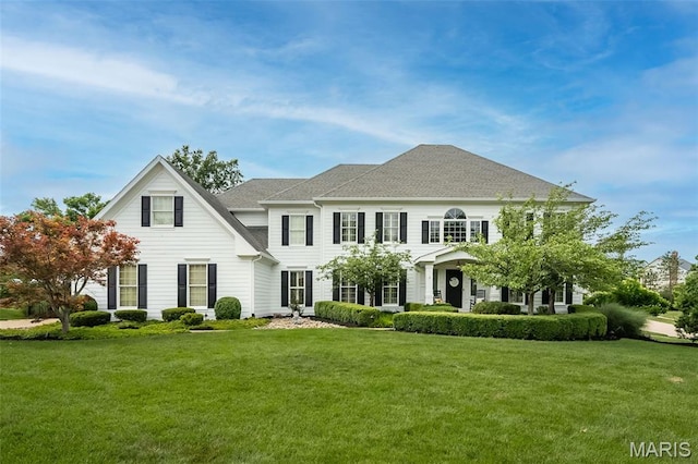 14703 Kulkarni Ct, Chesterfield, MO 63017 - view of front of house with a front lawn and a shingled roof
