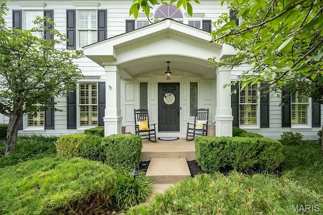 14703 Kulkarni Ct, Chesterfield, MO 63017 - doorway to property featuring covered porch