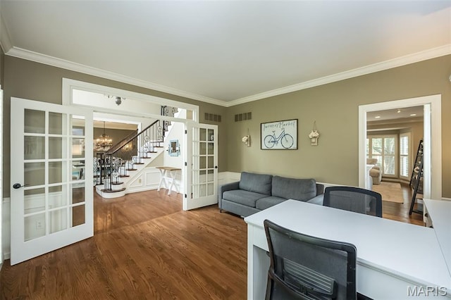 14703 Kulkarni Ct, Chesterfield, MO 63017 - living area featuring french doors, crown molding, dark wood-style floors, a chandelier, and stairway