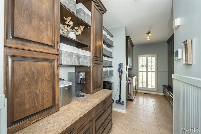 14703 Kulkarni Ct, Chesterfield, MO 63017 - kitchen with light countertops and light tile patterned floors