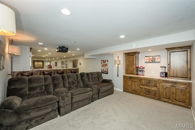 14703 Kulkarni Ct, Chesterfield, MO 63017 - home theater with recessed lighting, light colored carpet, and bar area