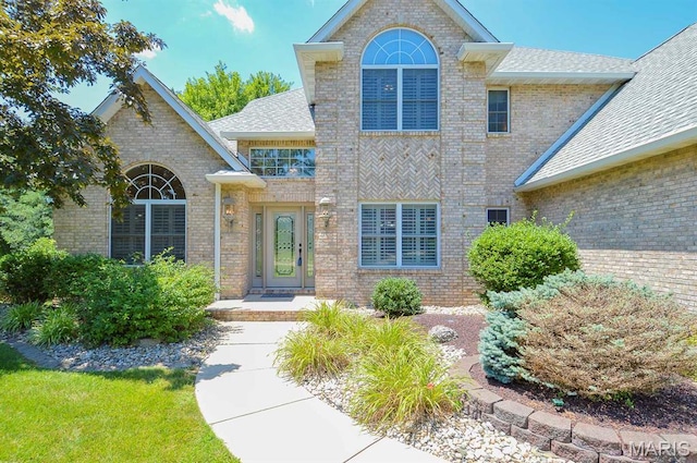 15 Fox Mill Dr, Maryville, IL 62062 - view of front of home featuring brick siding and a shingled roof