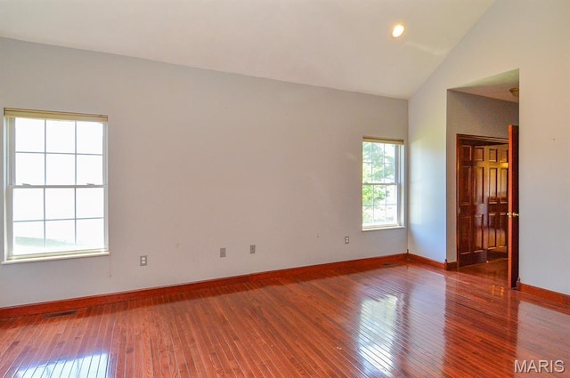 15 Fox Mill Dr, Maryville, IL 62062 - empty room with wood-type flooring and vaulted ceiling