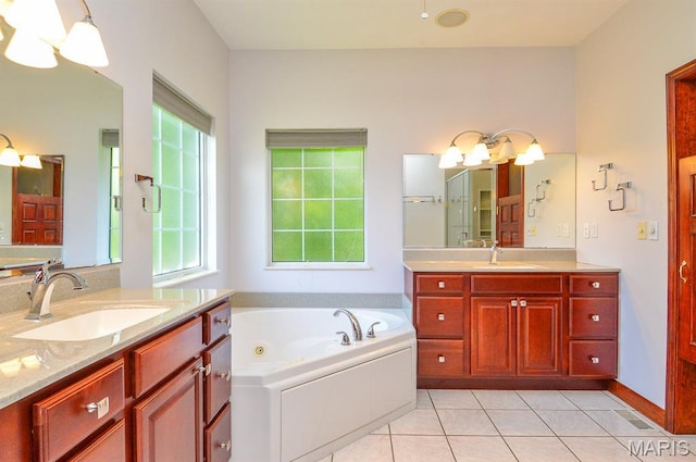 15 Fox Mill Dr, Maryville, IL 62062 - full bathroom featuring two vanities, tile patterned flooring, and a tub with jets