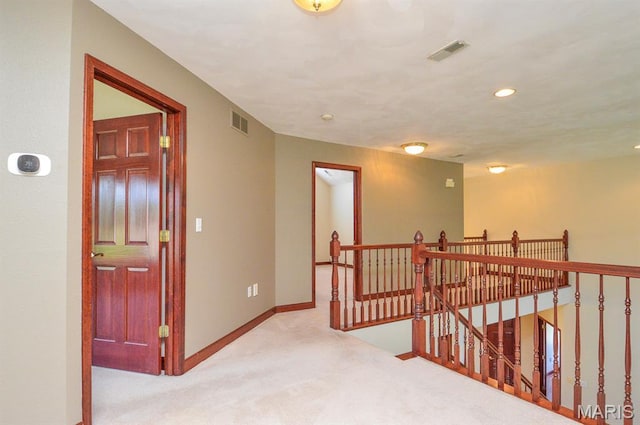 15 Fox Mill Dr, Maryville, IL 62062 - hallway with an upstairs landing, carpet flooring, and recessed lighting