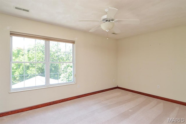 15 Fox Mill Dr, Maryville, IL 62062 - empty room with light colored carpet and a ceiling fan