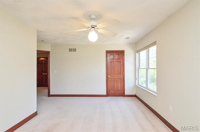 15 Fox Mill Dr, Maryville, IL 62062 - empty room with light colored carpet and ceiling fan