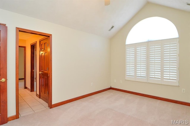 15 Fox Mill Dr, Maryville, IL 62062 - empty room featuring carpet flooring, vaulted ceiling, and ceiling fan