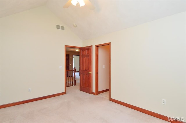 15 Fox Mill Dr, Maryville, IL 62062 - empty room featuring ceiling fan, light carpet, and high vaulted ceiling