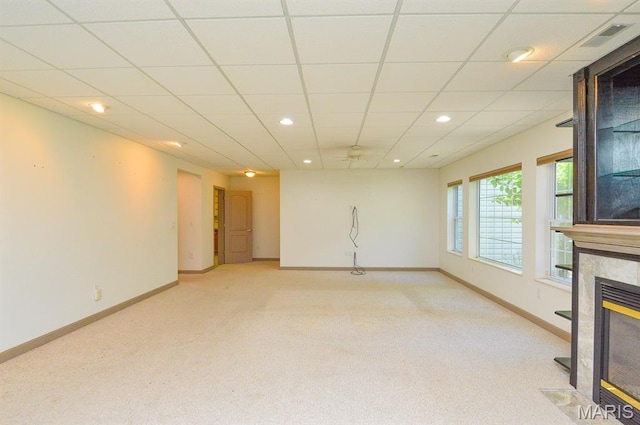15 Fox Mill Dr, Maryville, IL 62062 - unfurnished living room with light colored carpet, a fireplace, recessed lighting, and a drop ceiling