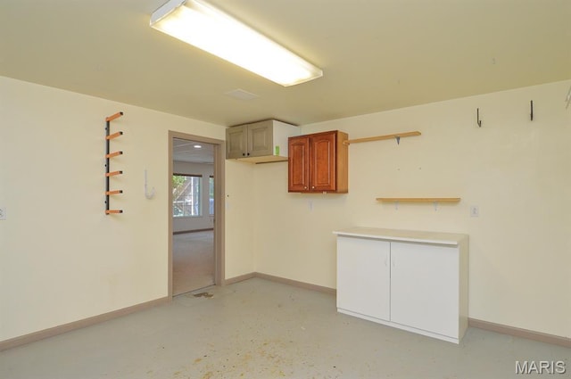 15 Fox Mill Dr, Maryville, IL 62062 - unfurnished room with baseboards and concrete flooring
