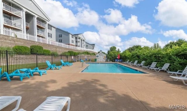 1239 Creve Coeur Crossing Ln Unit C, Chesterfield, MO 63017 - community pool featuring a patio area