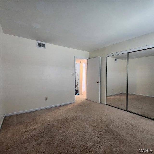 1239 Creve Coeur Crossing Ln Unit C, Chesterfield, MO 63017 - unfurnished bedroom featuring carpet flooring and a closet
