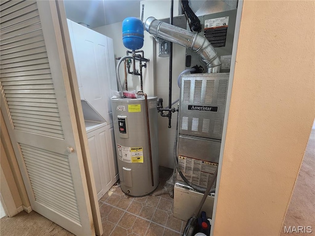 1239 Creve Coeur Crossing Ln Unit C, Chesterfield, MO 63017 - utility room featuring water heater