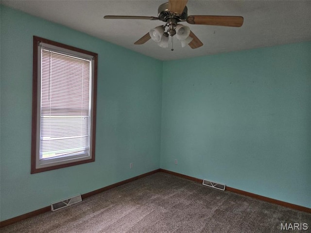 161 W Locust St, Hoyleton, IL 62803 - empty room with dark carpet and ceiling fan