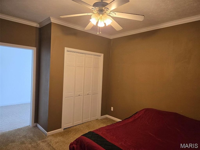 161 W Locust St, Hoyleton, IL 62803 - carpeted bedroom with ornamental molding, a closet, and a ceiling fan