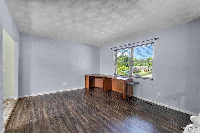 206 Saint Jude, Saint Genevieve, MO 63670 - unfurnished office featuring dark wood-type flooring and a textured ceiling