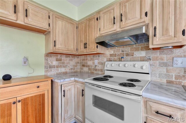 206 Saint Jude, Saint Genevieve, MO 63670 - kitchen with electric stove, under cabinet range hood, light countertops, decorative backsplash, and light brown cabinetry