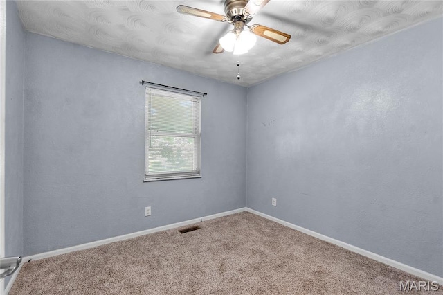 206 Saint Jude, Saint Genevieve, MO 63670 - spare room with carpet and a ceiling fan