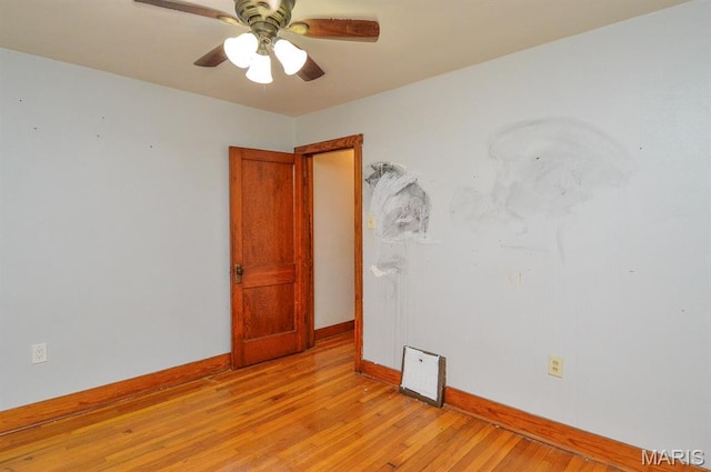 314 N 6th St, Mascoutah, IL 62258 - spare room featuring light wood-style flooring and a ceiling fan