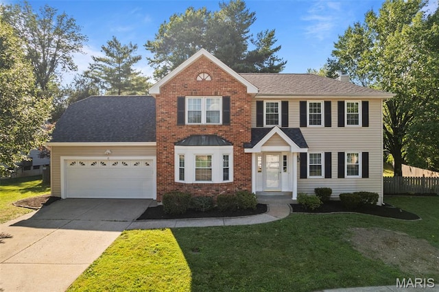 17 Beaujolais Dr, Florissant, MO 63031 - view of front of home featuring an attached garage, concrete driveway, brick siding, and a shingled roof