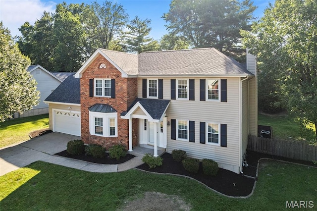17 Beaujolais Dr, Florissant, MO 63031 - view of front facade featuring a chimney, an attached garage, driveway, a shingled roof, and brick siding