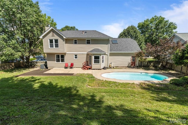 17 Beaujolais Dr, Florissant, MO 63031 - rear view of house with entry steps, a patio area, a chimney, and a fenced backyard