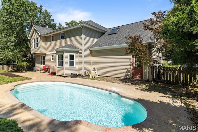 17 Beaujolais Dr, Florissant, MO 63031 - back of house with a patio, roof with shingles, and entry steps