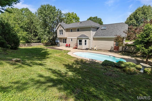 17 Beaujolais Dr, Florissant, MO 63031 - rear view of property featuring a fenced backyard, a patio, and entry steps