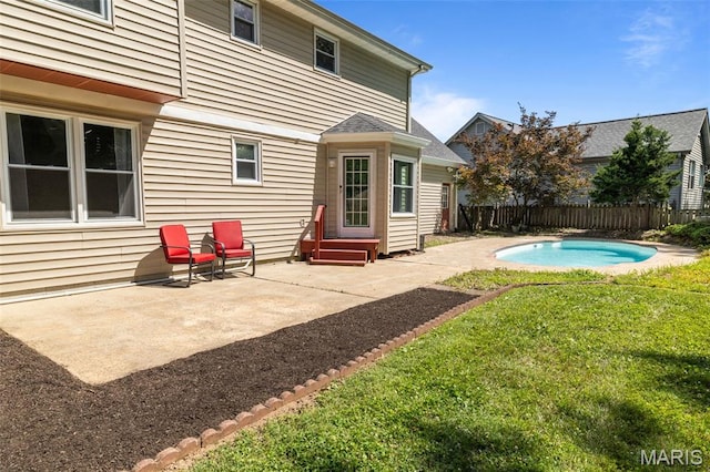 17 Beaujolais Dr, Florissant, MO 63031 - rear view of house with a patio area, entry steps, and a fenced backyard