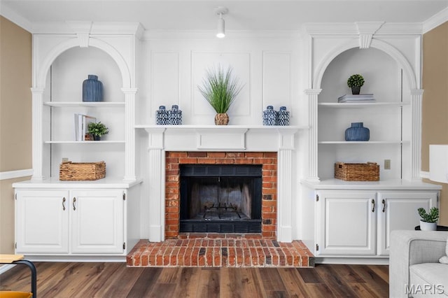 17 Beaujolais Dr, Florissant, MO 63031 - living room with a fireplace, dark wood finished floors, and built in shelves