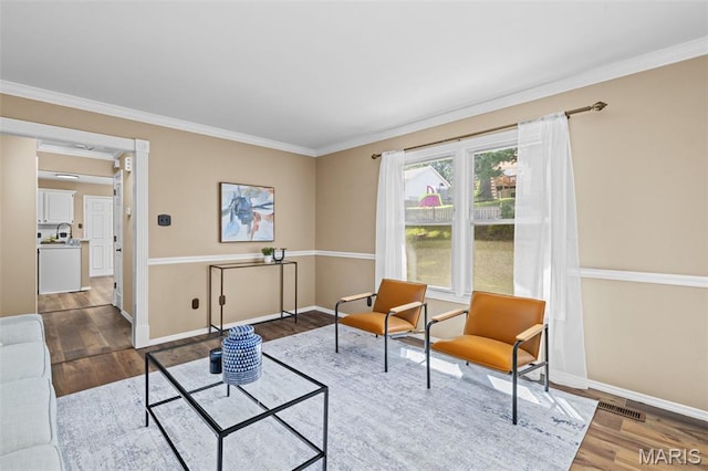 17 Beaujolais Dr, Florissant, MO 63031 - living room with wood finished floors and ornamental molding