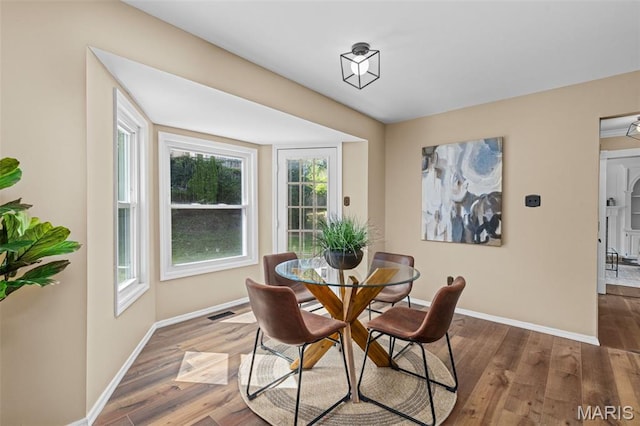 17 Beaujolais Dr, Florissant, MO 63031 - dining room featuring wood finished floors