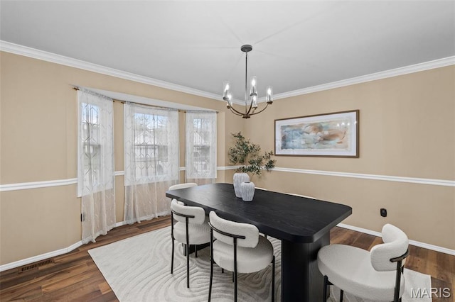 17 Beaujolais Dr, Florissant, MO 63031 - dining room with a chandelier, wood finished floors, and ornamental molding