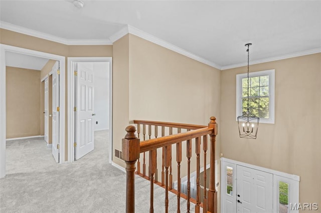 17 Beaujolais Dr, Florissant, MO 63031 - corridor featuring an upstairs landing, a chandelier, carpet floors, and crown molding