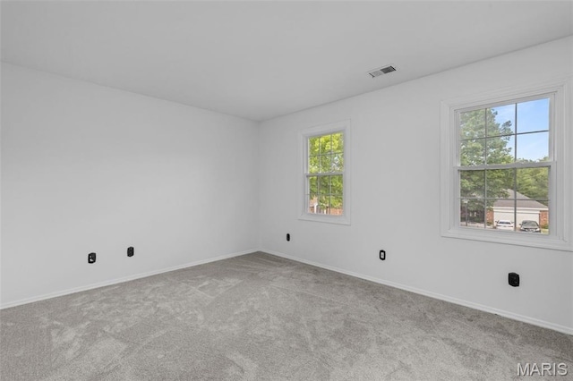 17 Beaujolais Dr, Florissant, MO 63031 - empty room with carpet flooring and baseboards