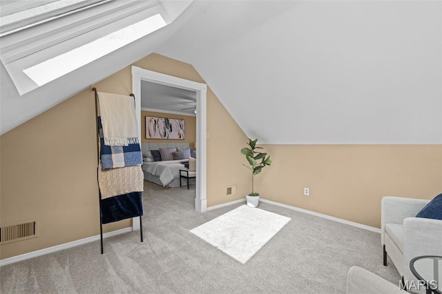 17 Beaujolais Dr, Florissant, MO 63031 - additional living space with a skylight, carpet flooring, and vaulted ceiling