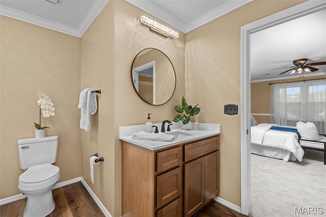 17 Beaujolais Dr, Florissant, MO 63031 - bathroom featuring vanity, crown molding, a ceiling fan, wood finished floors, and ensuite bath