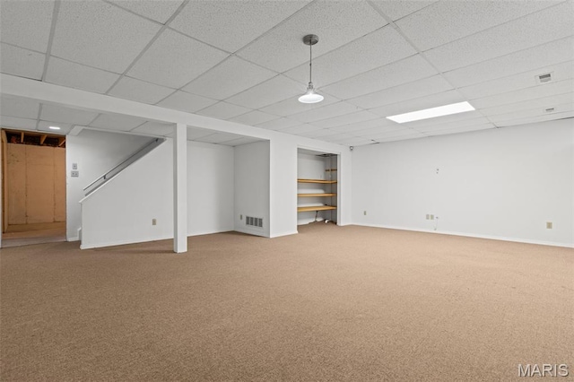 17 Beaujolais Dr, Florissant, MO 63031 - finished below grade area featuring carpet floors, a drop ceiling, and stairs