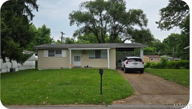 10288 Dacey Dr, Dellwood, MO 63136 - view of front of home featuring a carport and concrete driveway