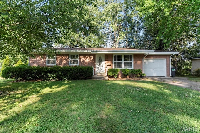 432 N 9th St, Mascoutah, IL 62258 - ranch-style house with an attached garage, a front yard, driveway, and brick siding