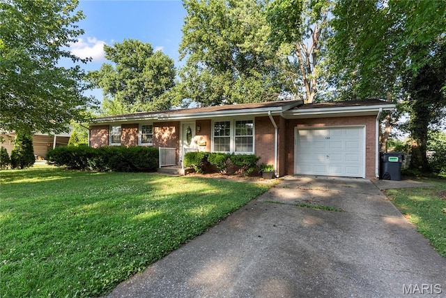 432 N 9th St, Mascoutah, IL 62258 - ranch-style home with a garage, a front lawn, driveway, and brick siding