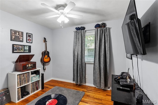 432 N 9th St, Mascoutah, IL 62258 - game room with wood finished floors and a ceiling fan