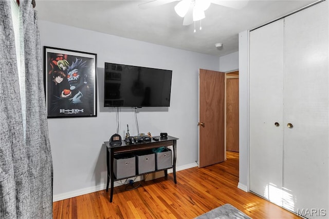 432 N 9th St, Mascoutah, IL 62258 - bedroom featuring wood finished floors, a closet, and a ceiling fan