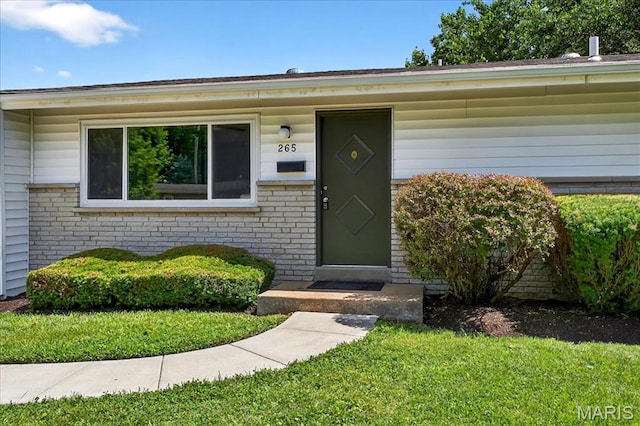 265 Francisca Dr, Florissant, MO 63031 - entrance to property with brick siding