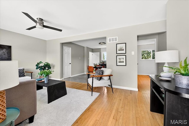 265 Francisca Dr, Florissant, MO 63031 - living room with ceiling fan and light wood-style flooring